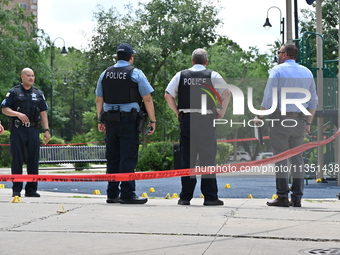 A 44-year-old male victim is being shot multiple times and killed in broad daylight at the Dearborn Homes Playground in Chicago, Illinois, U...