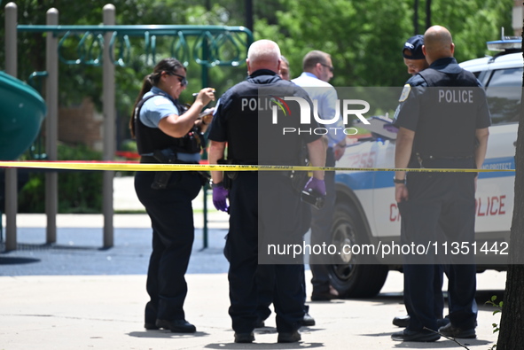 A 44-year-old male victim is being shot multiple times and killed in broad daylight at the Dearborn Homes Playground in Chicago, Illinois, U...