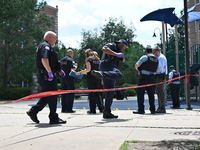 A 44-year-old male victim is being shot multiple times and killed in broad daylight at the Dearborn Homes Playground in Chicago, Illinois, U...