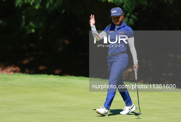 Mariah Stackhouse of Riverdale, Georgia acknowledges the fans at the 15th green during the second round of the KPMG Women's PGA Championship...