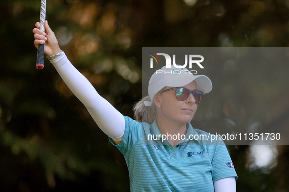 Sarah Kemp of Australia gestures after hitting on the 16th tee during the second round of the KPMG Women's PGA Championship at Sahalee Count...