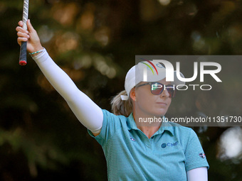 Sarah Kemp of Australia gestures after hitting on the 16th tee during the second round of the KPMG Women's PGA Championship at Sahalee Count...