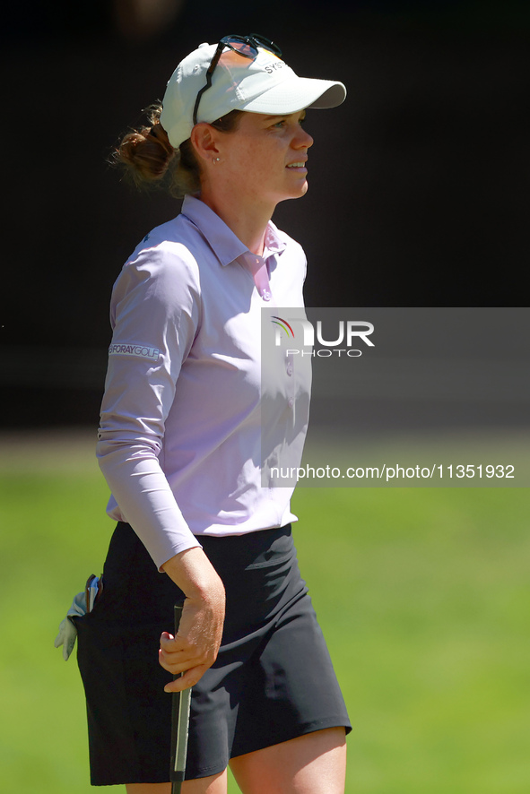 Sarah Schmelzel of Phoenix, Arizona walks to the 18th green during the second round of the KPMG Women's PGA Championship at Sahalee Country...