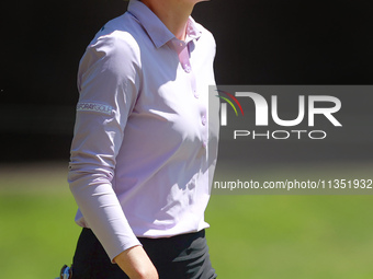 Sarah Schmelzel of Phoenix, Arizona walks to the 18th green during the second round of the KPMG Women's PGA Championship at Sahalee Country...