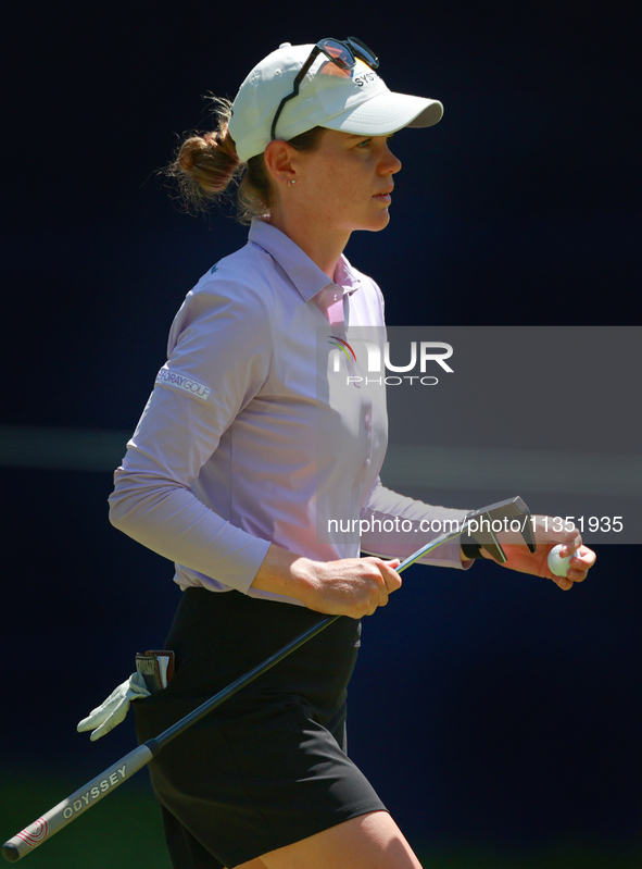 Sarah Schmelzel of Phoenix, Arizona walks off the 18th green during the second round of the KPMG Women's PGA Championship at Sahalee Country...