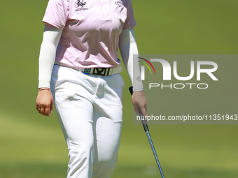 Ruoning Yin of China looks over the 2nd green during the second round of the KPMG Women's PGA Championship at Sahalee Country Club on Friday...