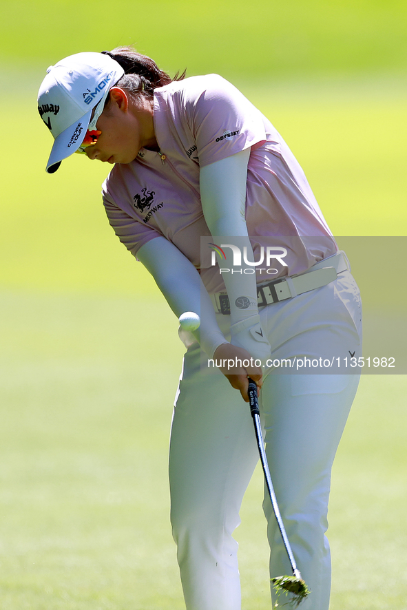 Ruoning Yin of China hits from the 3rd fairway during the second round of the KPMG Women's PGA Championship at Sahalee Country Club on Frida...