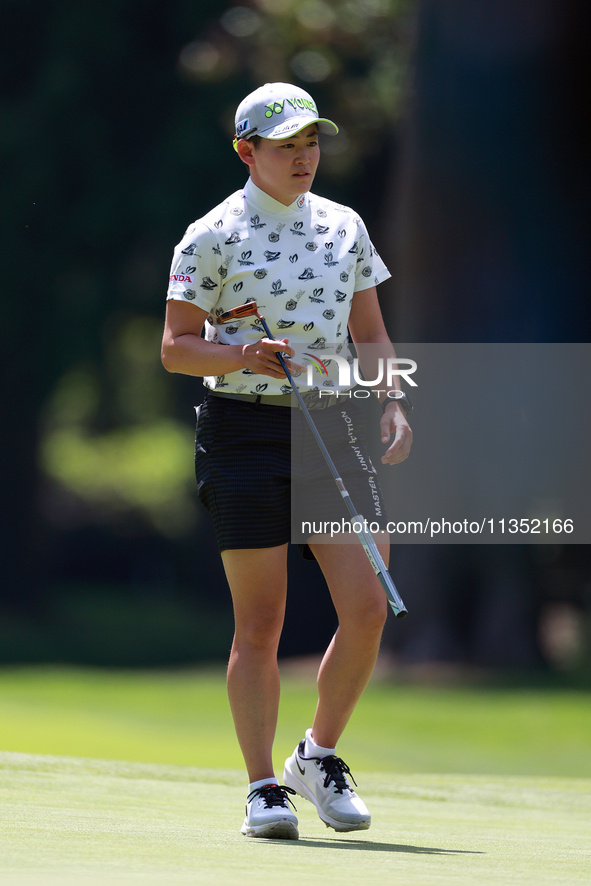 Akie Iwai of Japan walks on the 6th green during the second round of the KPMG Women's PGA Championship at Sahalee Country Club on Friday, Ju...