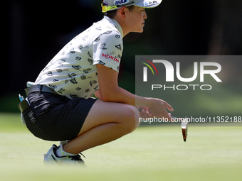 Akie Iwai of Japan looks over the 6th green during the second round of the KPMG Women's PGA Championship at Sahalee Country Club on Friday,...