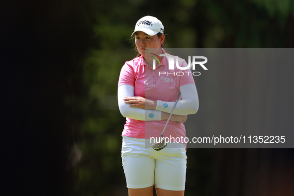 Allisen Corpuz of Kapolei, Hawaii waits on the 6th green during the second round of the KPMG Women's PGA Championship at Sahalee Country Clu...