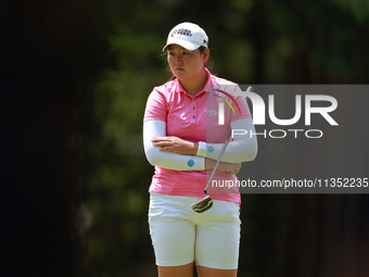 Allisen Corpuz of Kapolei, Hawaii waits on the 6th green during the second round of the KPMG Women's PGA Championship at Sahalee Country Clu...