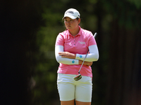 Allisen Corpuz of Kapolei, Hawaii waits on the 6th green during the second round of the KPMG Women's PGA Championship at Sahalee Country Clu...