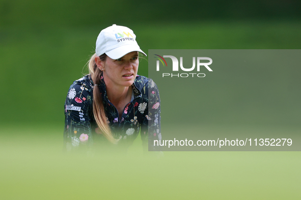 Sarah Schmelzel of the United States lines up her putt on the 9th green during Day Three of the KPMG Women's PGA Championship at Sahalee Cou...