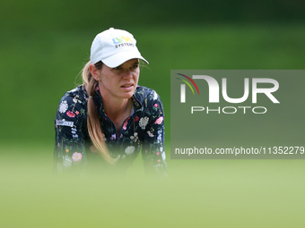 Sarah Schmelzel of the United States lines up her putt on the 9th green during Day Three of the KPMG Women's PGA Championship at Sahalee Cou...