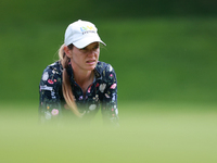 Sarah Schmelzel of the United States lines up her putt on the 9th green during Day Three of the KPMG Women's PGA Championship at Sahalee Cou...