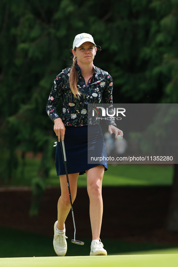 Sarah Schmelzel of the United States acknowledges the gallery at the 9th green during Day Three of the KPMG Women's PGA Championship at Saha...