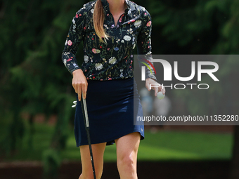 Sarah Schmelzel of the United States acknowledges the gallery at the 9th green during Day Three of the KPMG Women's PGA Championship at Saha...