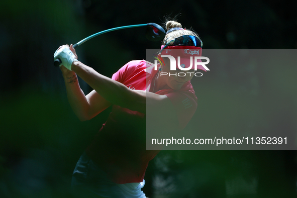 Lexi Thompson of the United States tees off on the second hole during Day Three of the KPMG Women's PGA Championship at Sahalee Country Club...