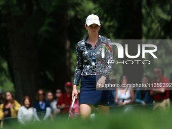 Sarah Schmelzel of the United States lines up her putt on the first green during Day Three of the KPMG Women's PGA Championship at Sahalee C...