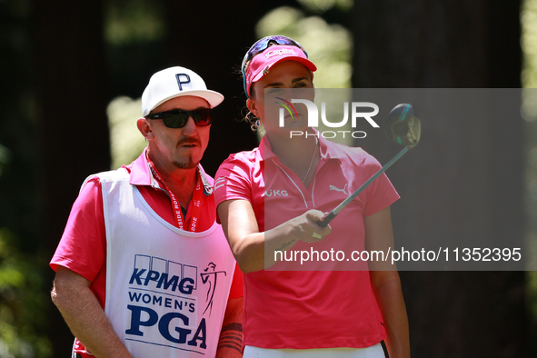 Lexi Thompson of the United States interacts with her caddy on the third hole during Day Three of the KPMG Women's PGA Championship at Sahal...