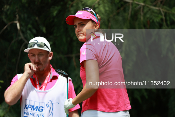 Lexi Thompson of the United States tees off on the 4th hole during Day Three of the KPMG Women's PGA Championship at Sahalee Country Club in...