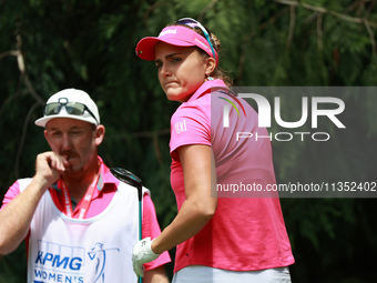 Lexi Thompson of the United States tees off on the 4th hole during Day Three of the KPMG Women's PGA Championship at Sahalee Country Club in...