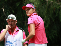 Lexi Thompson of the United States tees off on the 4th hole during Day Three of the KPMG Women's PGA Championship at Sahalee Country Club in...