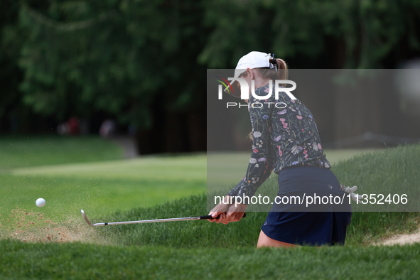 Sarah Schmelzel of the United States hits out of the bunker on the 6th green during Day Three of the KPMG Women's PGA Championship at Sahale...