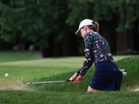 Sarah Schmelzel of the United States hits out of the bunker on the 6th green during Day Three of the KPMG Women's PGA Championship at Sahale...