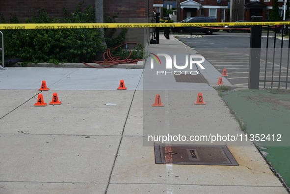 Shell casings are being located at the crime scene. A 49-year-old man is being shot and killed outside at Daniel J. Corkery Elementary Schoo...