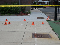 Shell casings are being located at the crime scene. A 49-year-old man is being shot and killed outside at Daniel J. Corkery Elementary Schoo...