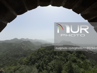 The Jinshanling Great Wall is being seen under sandstorm pollution in Chengde, China, on June 22, 2024. (