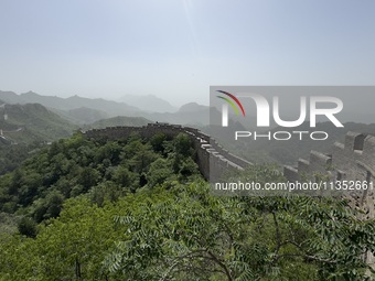 The Jinshanling Great Wall is being seen under sandstorm pollution in Chengde, China, on June 22, 2024. (