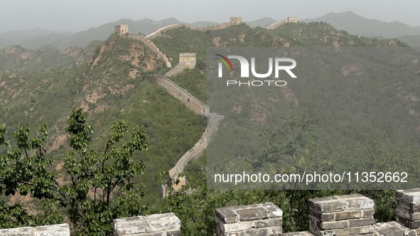 The Jinshanling Great Wall is being seen under sandstorm pollution in Chengde, China, on June 22, 2024. 