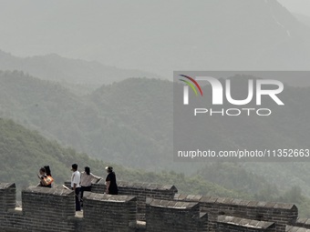 The Jinshanling Great Wall is being seen under sandstorm pollution in Chengde, China, on June 22, 2024. (