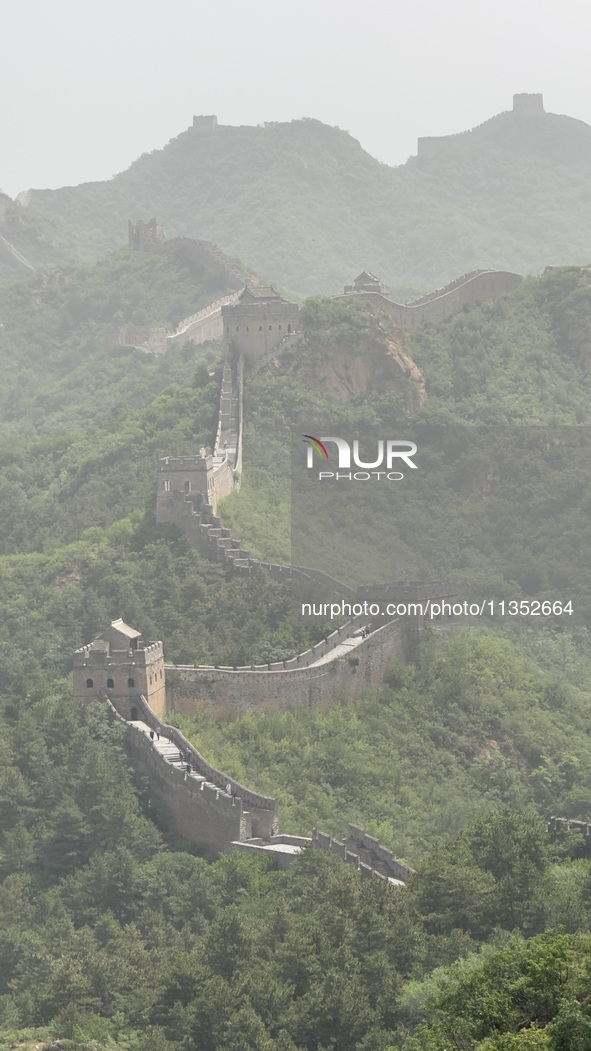 The Jinshanling Great Wall is being seen under sandstorm pollution in Chengde, China, on June 22, 2024. 