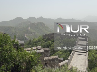 The Jinshanling Great Wall is being seen under sandstorm pollution in Chengde, China, on June 22, 2024. (