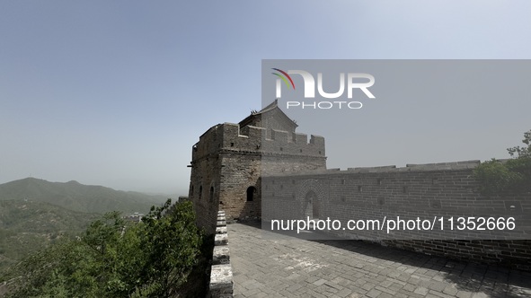 The Jinshanling Great Wall is being seen under sandstorm pollution in Chengde, China, on June 22, 2024. 