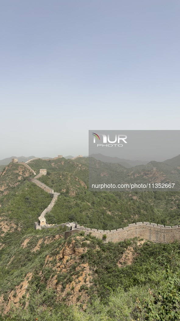 The Jinshanling Great Wall is being seen under sandstorm pollution in Chengde, China, on June 22, 2024. 