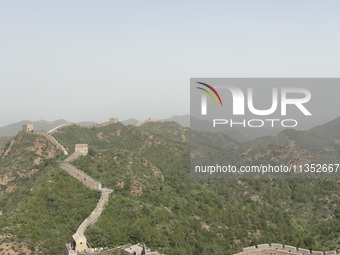 The Jinshanling Great Wall is being seen under sandstorm pollution in Chengde, China, on June 22, 2024. (