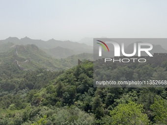 The Jinshanling Great Wall is being seen under sandstorm pollution in Chengde, China, on June 22, 2024. (