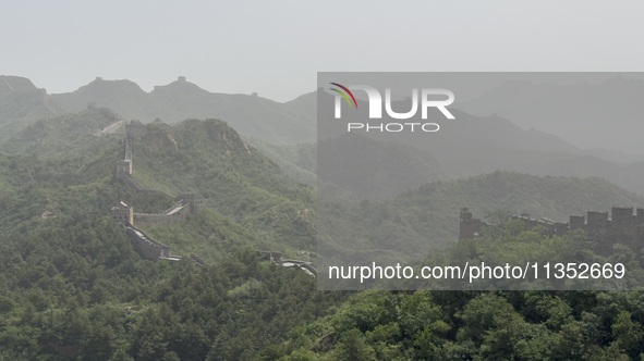 The Jinshanling Great Wall is being seen under sandstorm pollution in Chengde, China, on June 22, 2024. 