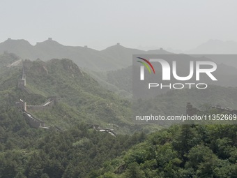 The Jinshanling Great Wall is being seen under sandstorm pollution in Chengde, China, on June 22, 2024. (