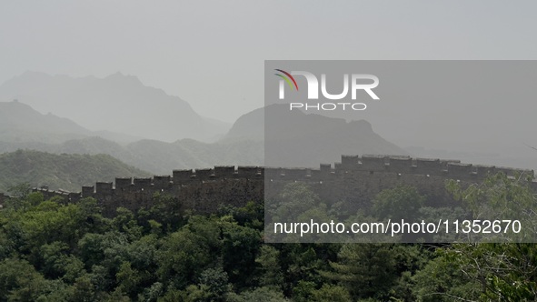 The Jinshanling Great Wall is being seen under sandstorm pollution in Chengde, China, on June 22, 2024. 