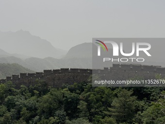 The Jinshanling Great Wall is being seen under sandstorm pollution in Chengde, China, on June 22, 2024. (