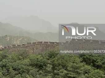 The Jinshanling Great Wall is being seen under sandstorm pollution in Chengde, China, on June 22, 2024. (