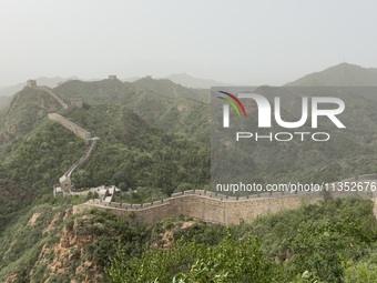 The Jinshanling Great Wall is being seen under sandstorm pollution in Chengde, China, on June 22, 2024. (