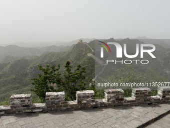 The Jinshanling Great Wall is being seen under sandstorm pollution in Chengde, China, on June 22, 2024. (