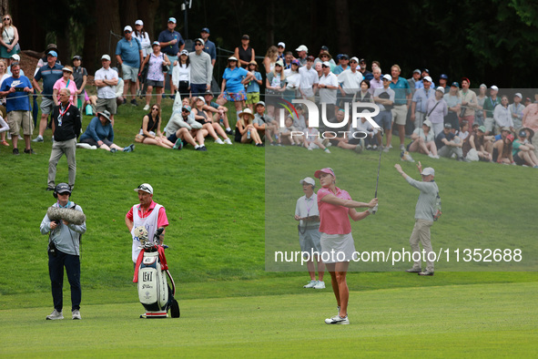 Lexi Thompson of the United States follows her fairway shot on the 18th hole toward the green during Day Three of the KPMG Women's PGA Champ...