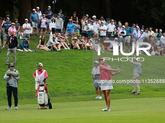 Lexi Thompson of the United States follows her fairway shot on the 18th hole toward the green during Day Three of the KPMG Women's PGA Champ...